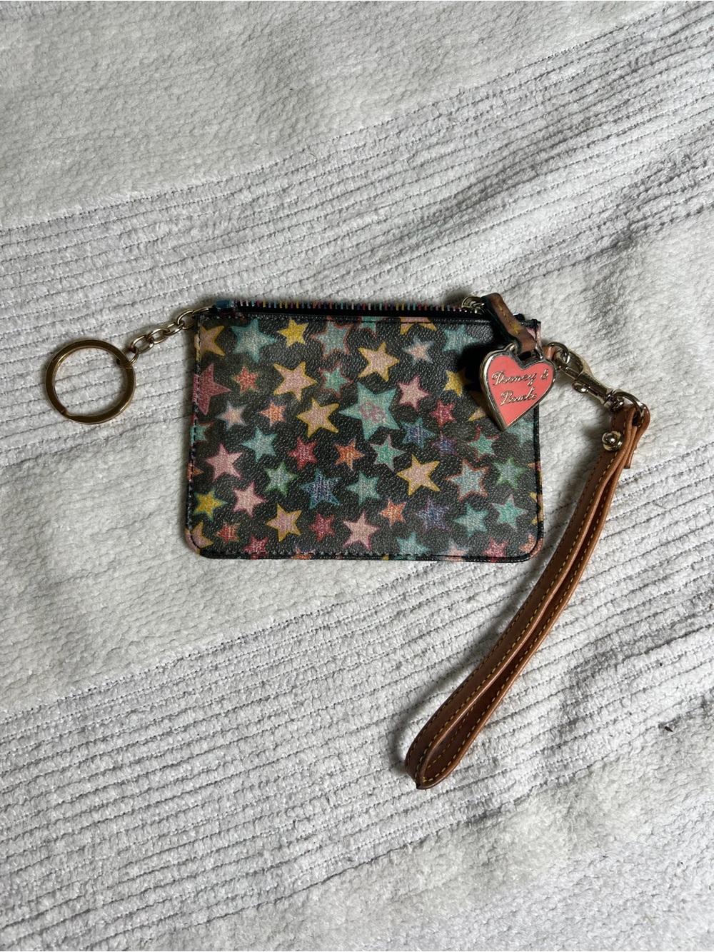Dooney & Bourke Star Print Wristlet with signature Heart Charm
